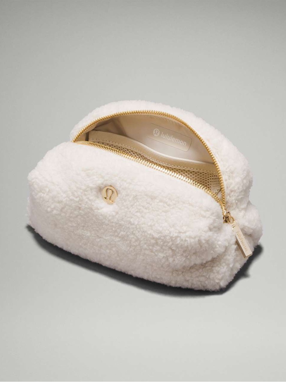 New without tags, Lululemon Mini Fleece Pouch in Cream 😍